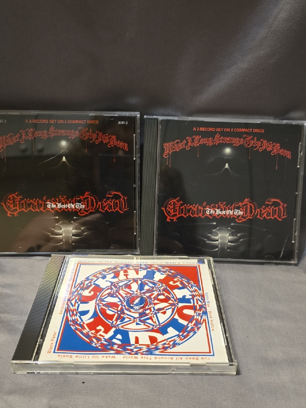 Grateful Dead CDs with Black & Red and Red/Blue Artwork